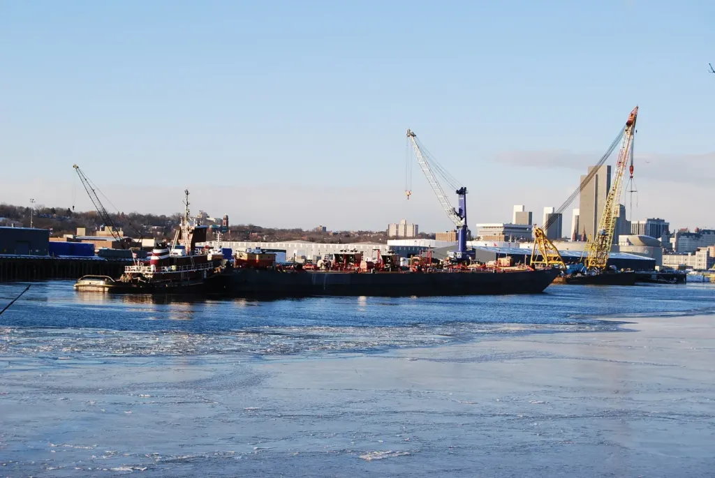A cargo ship docked on the Hudson River at the Port of Albany-Rensselaer
